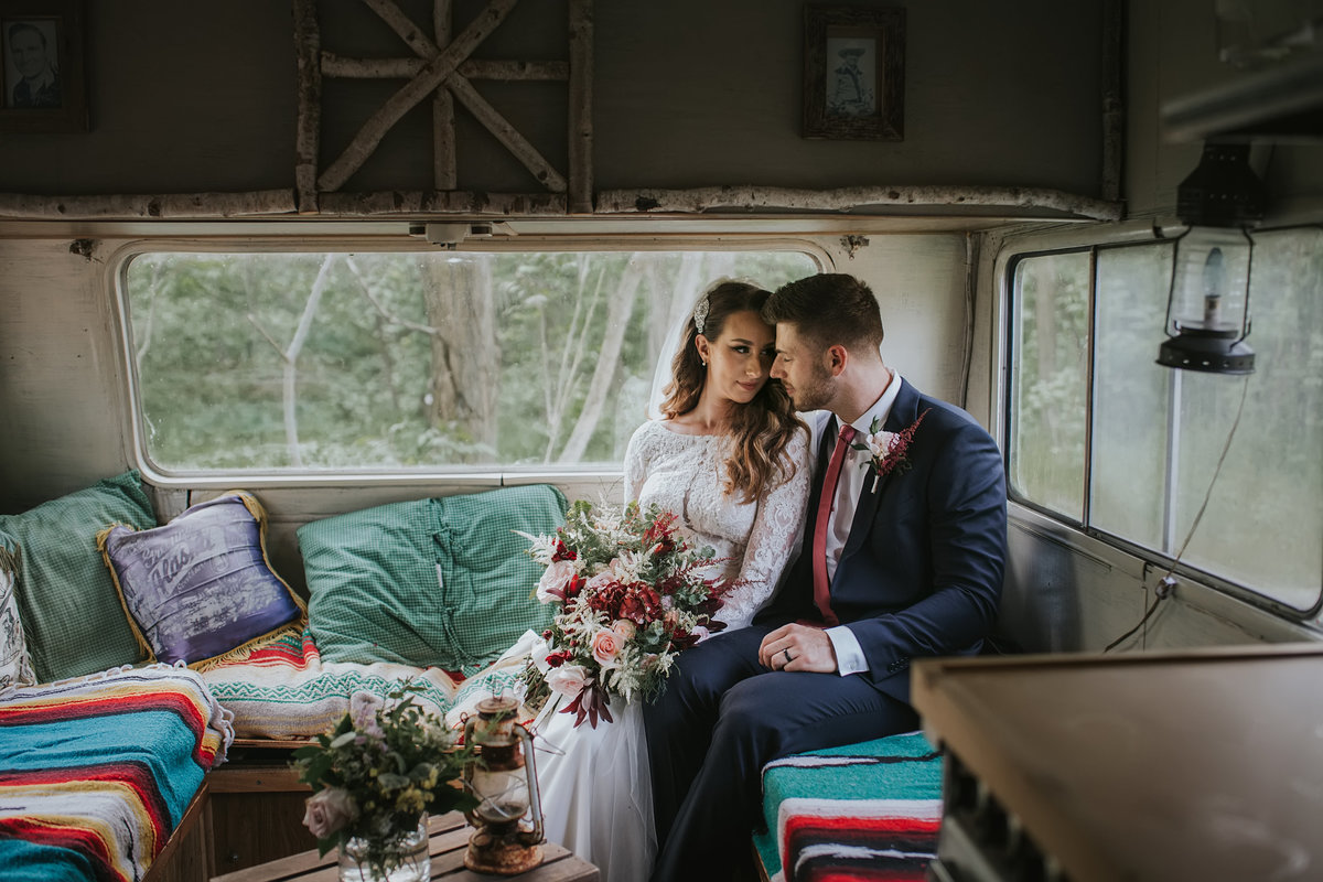 bride and groom in trailer