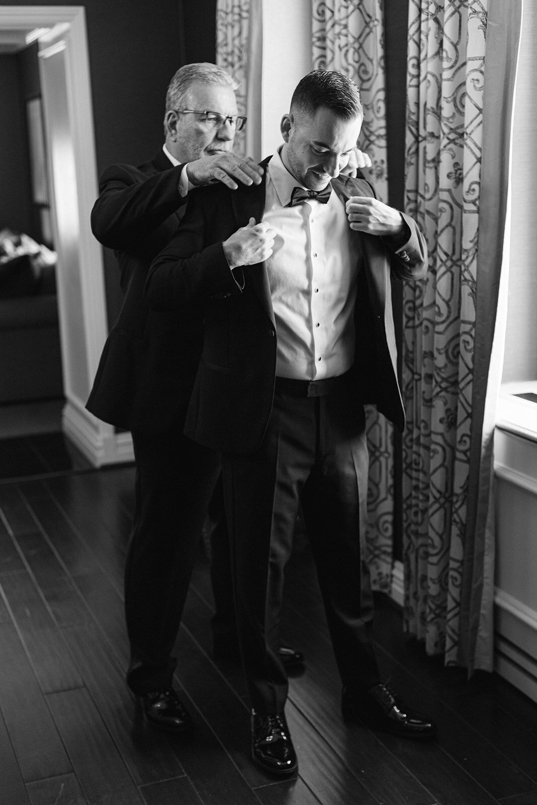 Bride and groom celebrating at the Omni William Penn Hotel wedding in Pittsburgh