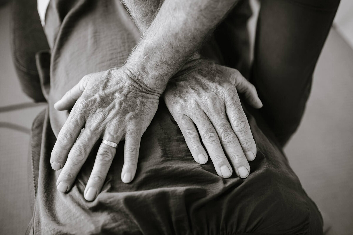 hand massaging up close from branding session of chiropractor