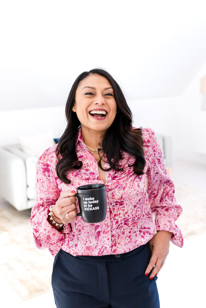 Female entrepreneur with inspirational coffee mug