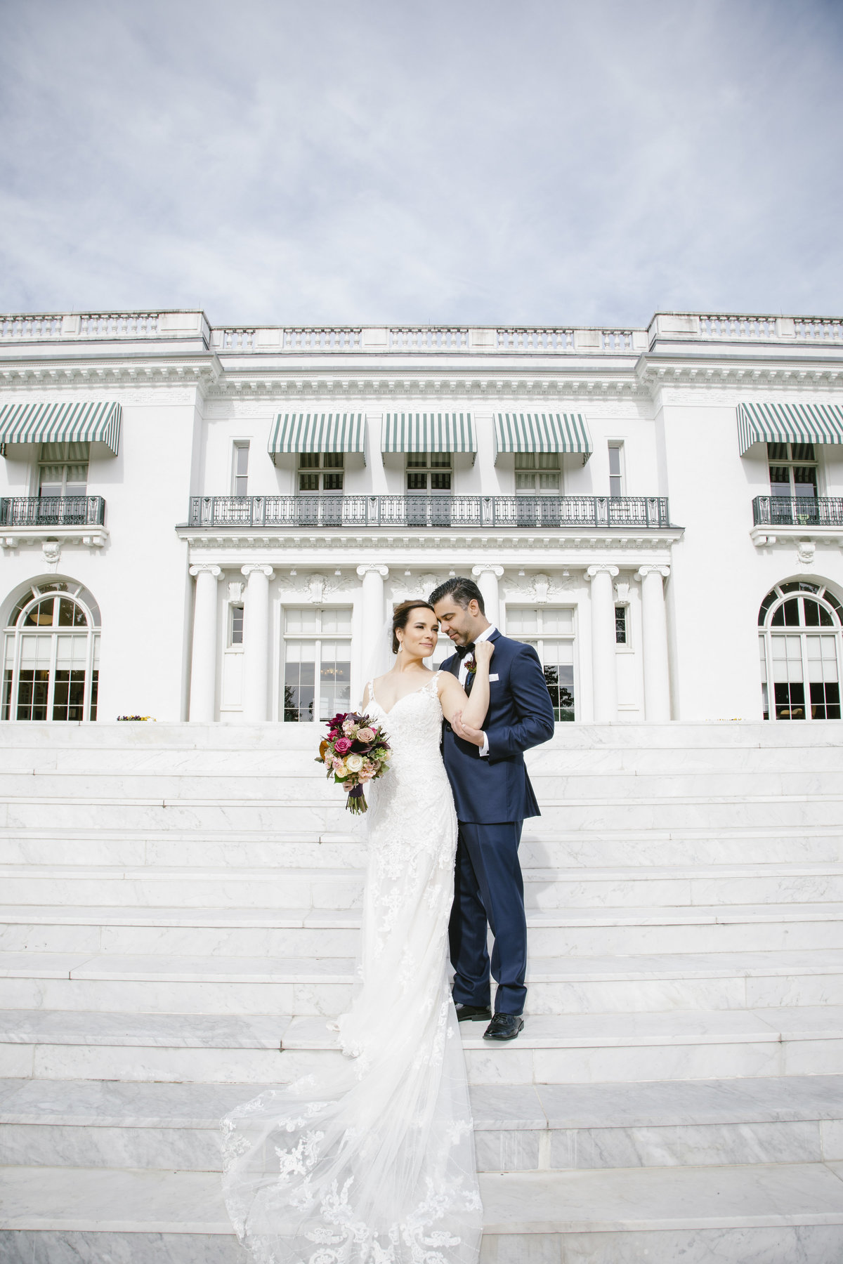 bride and groom outside monmouth university wedding