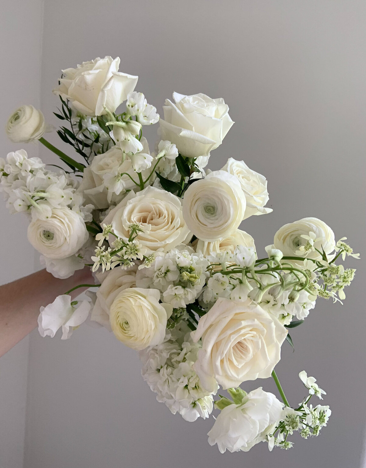 White, glowy bridal bouquet for a Utah wedding.