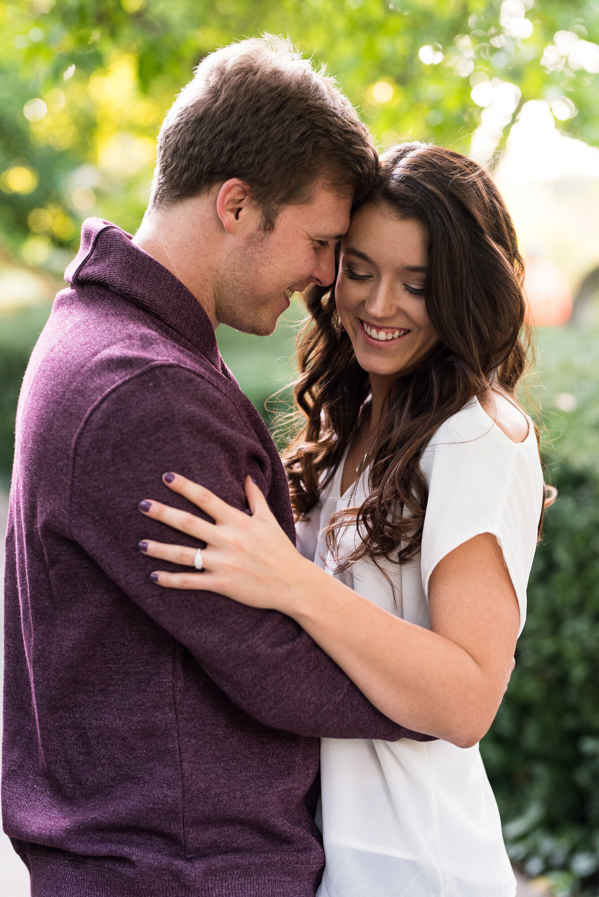 Couple snuggles during their engagement session