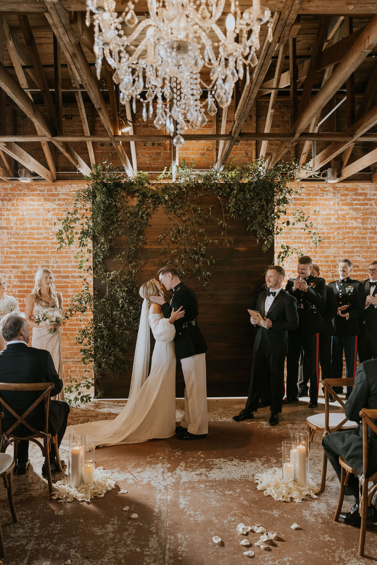 Wedding ceremony at classic greenery and white wedding at the St vrain