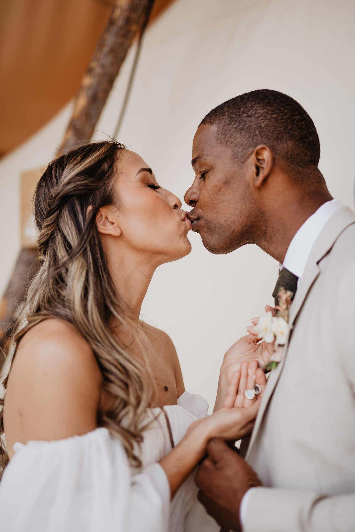 Utah Elopement Photographer captures man and woman kissing