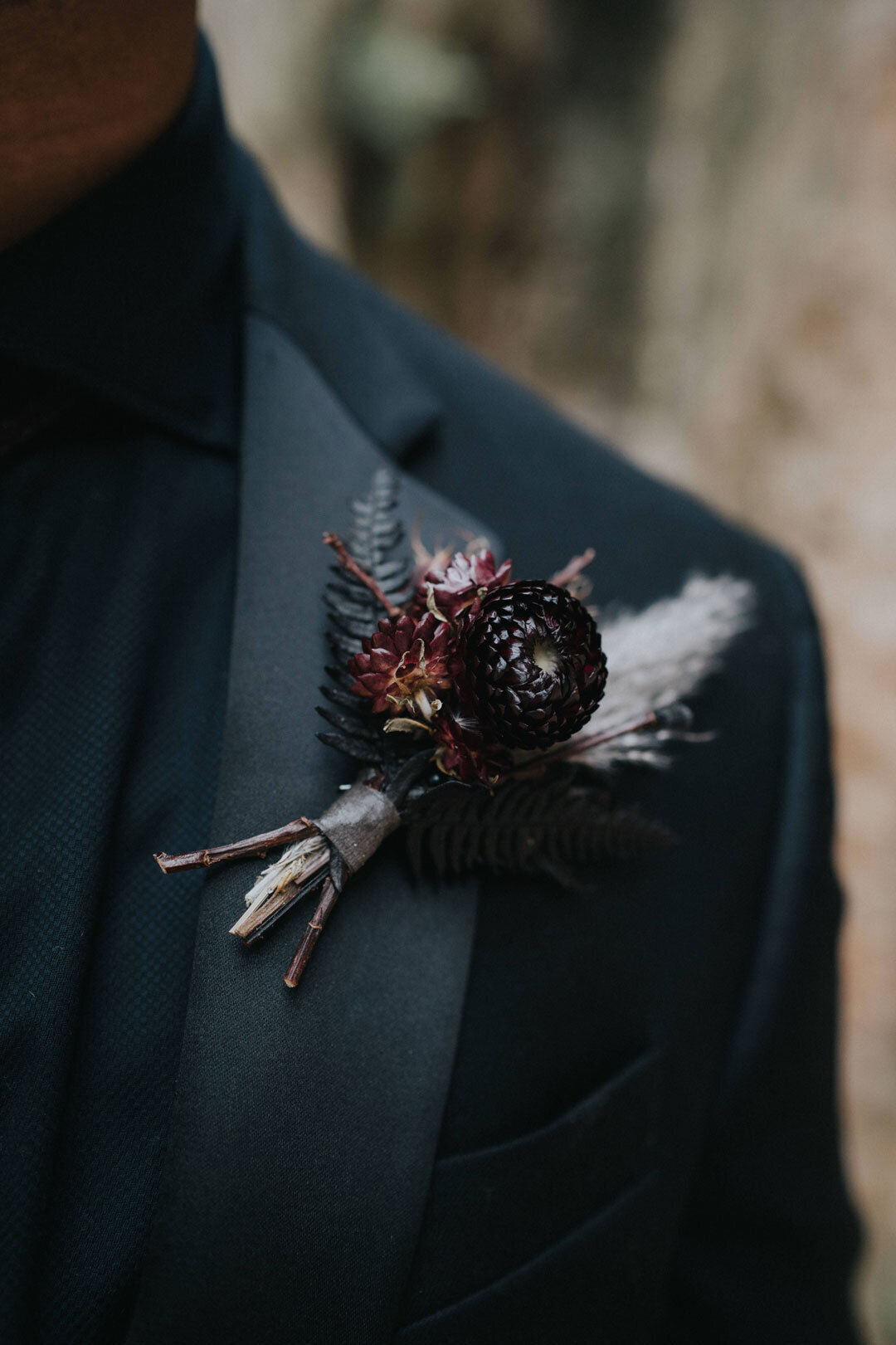 Black and white boutonniere