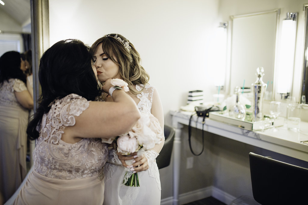 Wedding Photograph Of Bride Kissing Her Mother Los Angeles