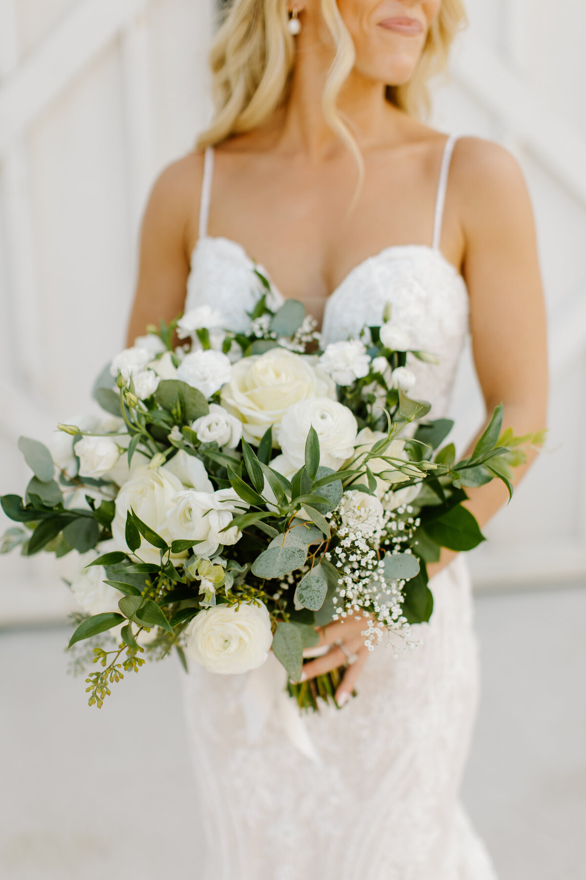 Full bridal bouquet of ivory and greenery