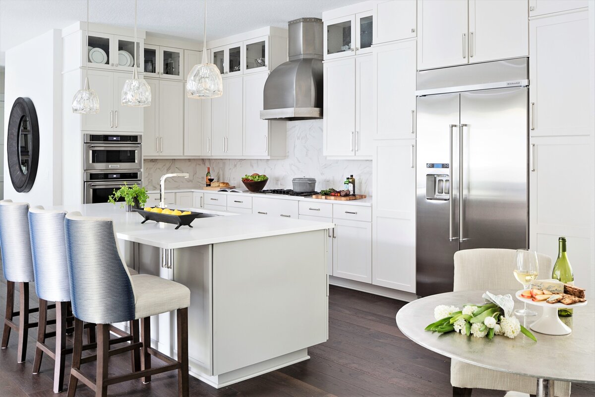 Aesthetic White Kitchen Cabinets with Comfy Chairs