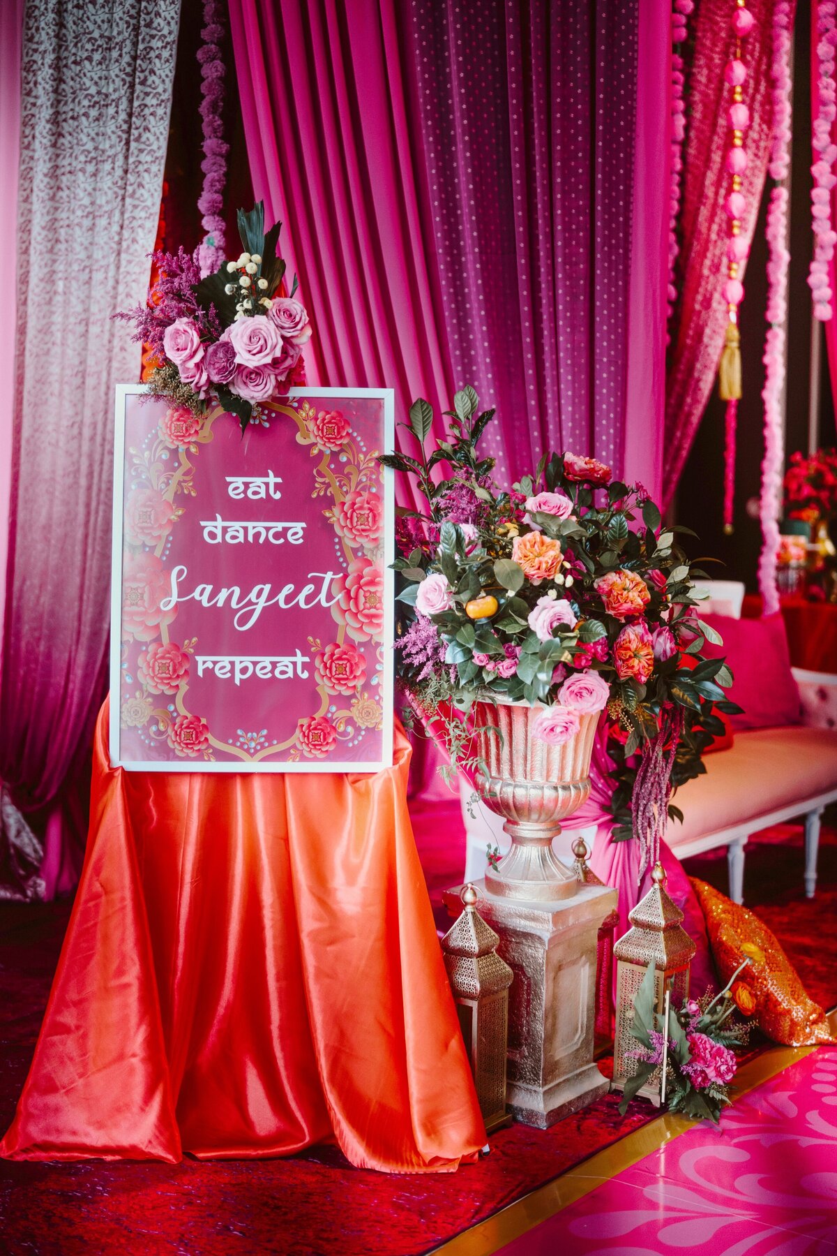 red-pink-orange-gold-sangeet-decor-flowers-08