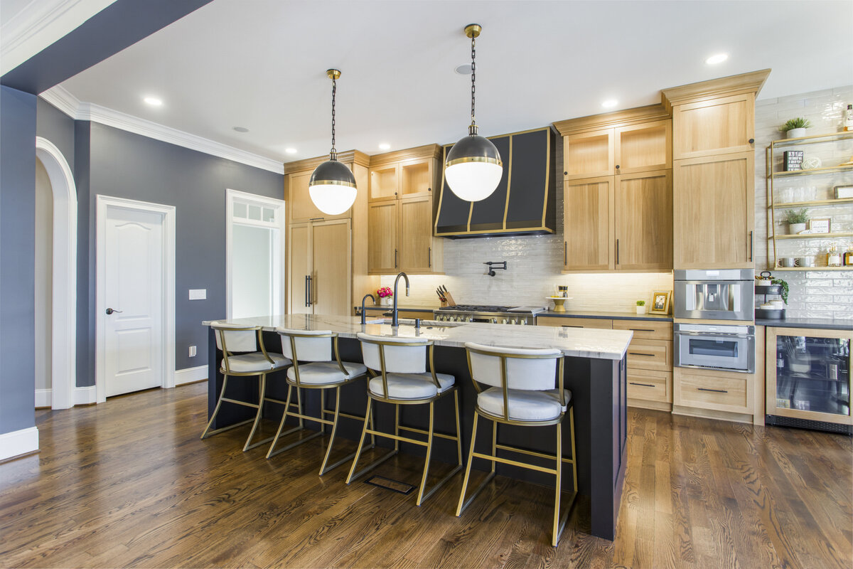 Light wood kitchen with gold accent features