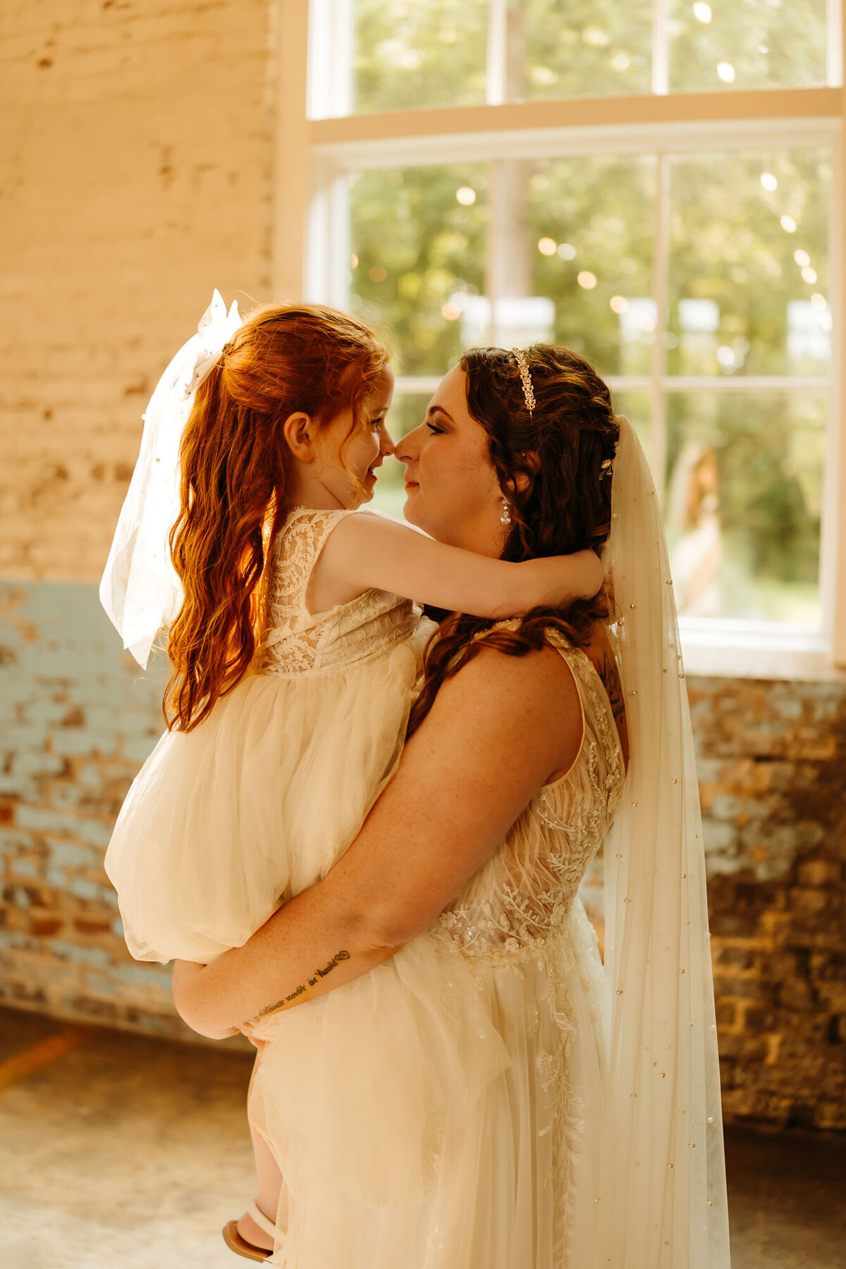 mom and daughter at wedding