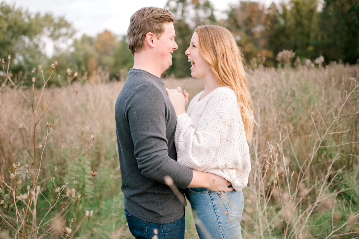 Niagara Wedding Photography of Engaged Couple in a field
