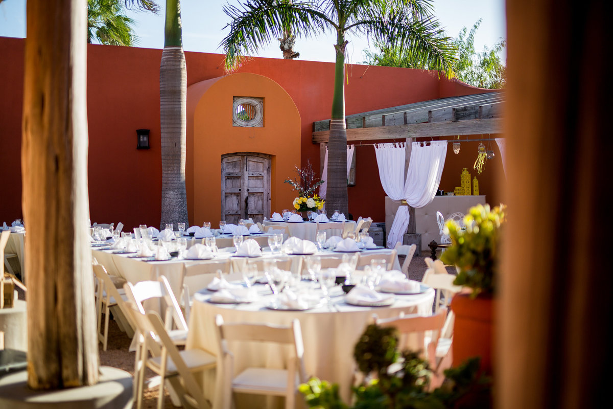 Wedding reception tables and decor outdoor wedding venue at Casa Mariposa in South Padre Island beach wedding