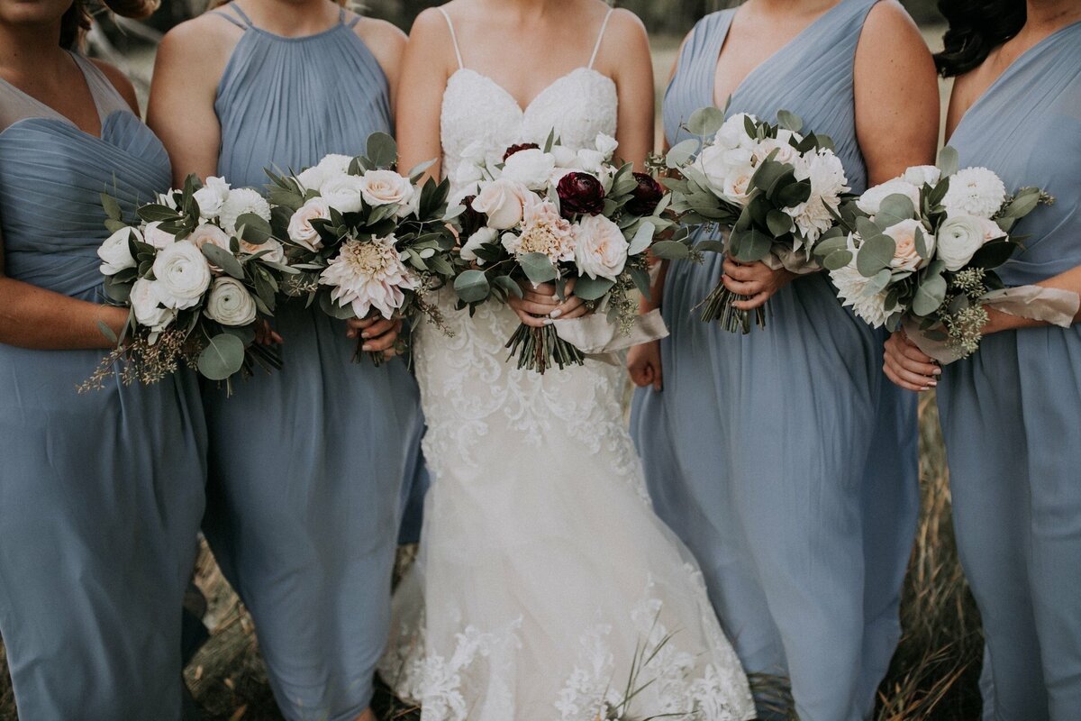 Classic bridal bouquets with pink, white, and burgundy by Hen & Chicks, classic Calgary, Alberta wedding florist, featured on the Brontë Bride Vendor Guide.
