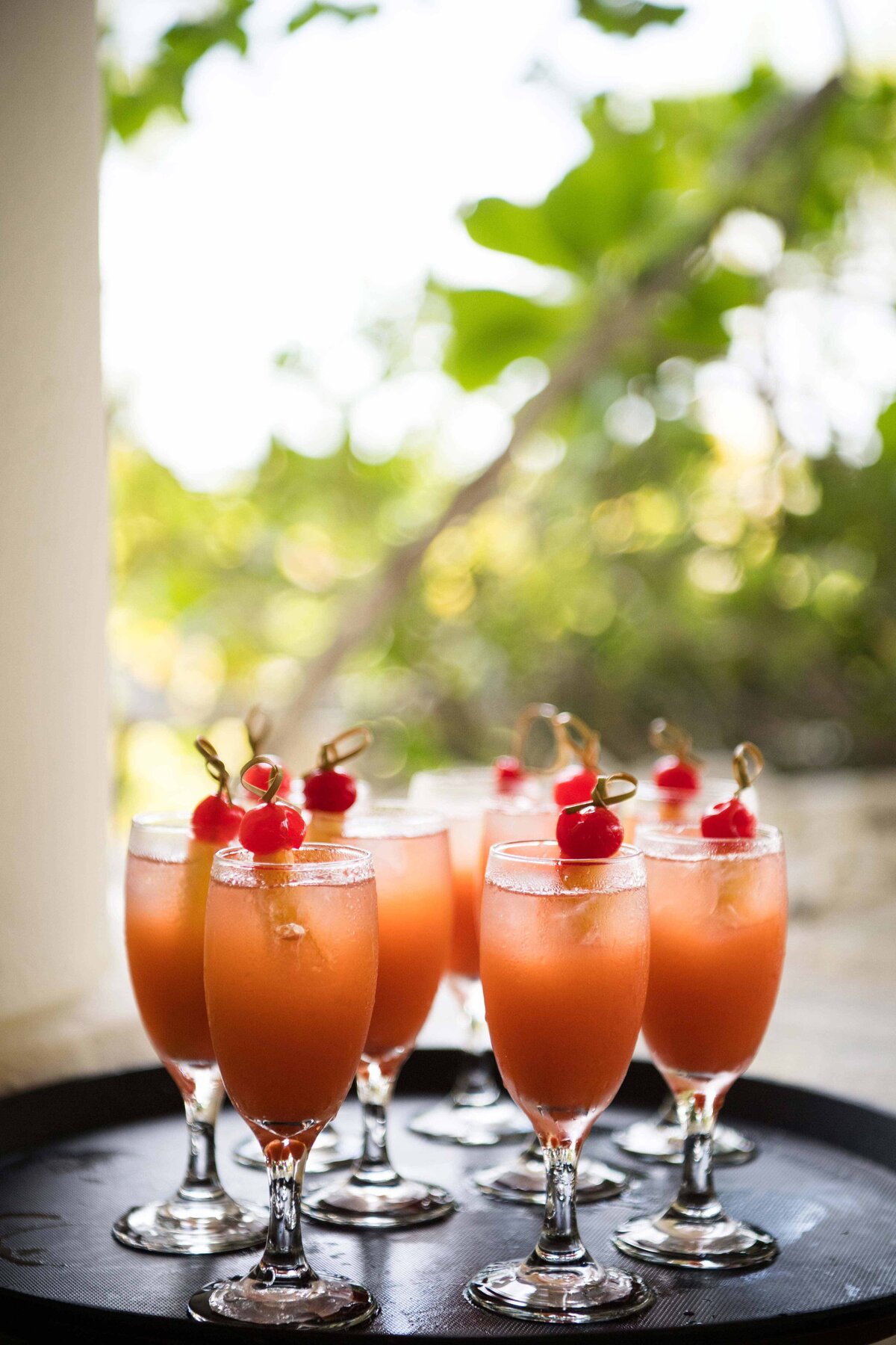 Cocktails on serving platter at tropical destination corporate event