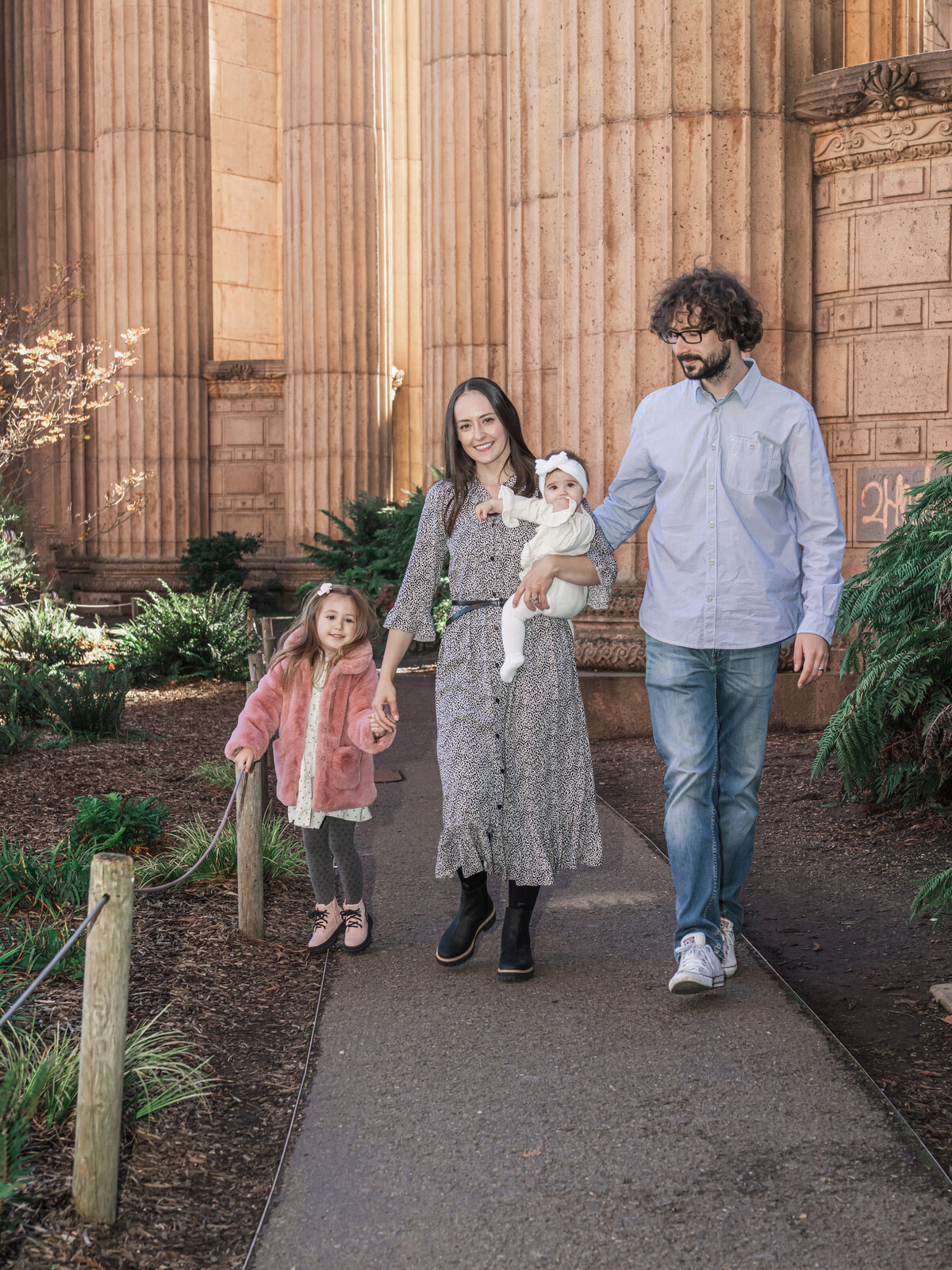 Portrait of a family strolling at the Palace of Fine Arts