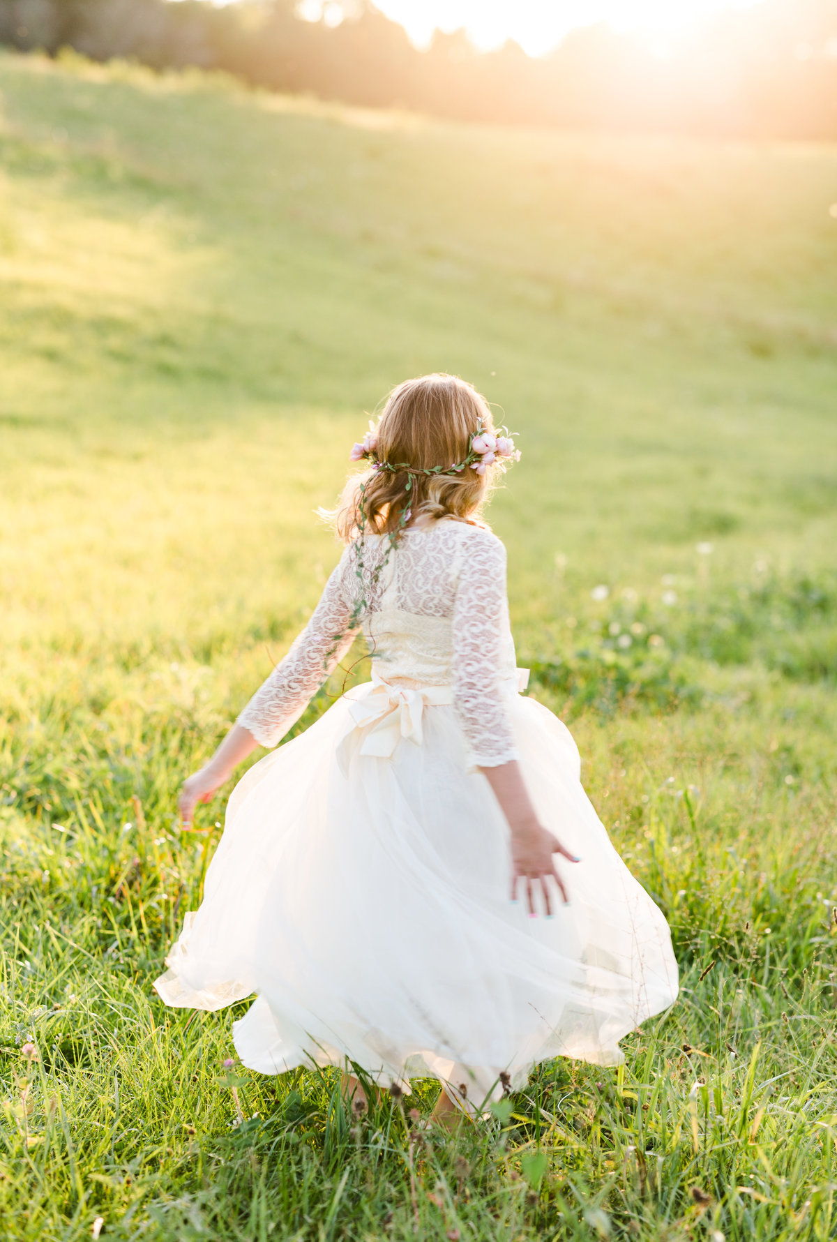 Young girl twirling at Abingdon Farm photo session