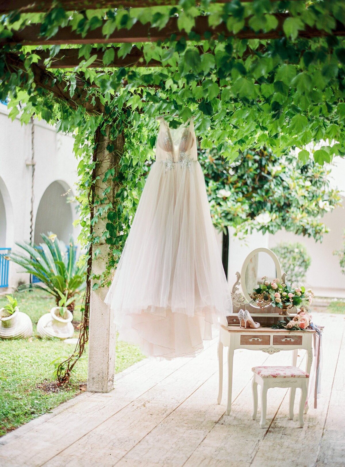 wedding-dress-hanging-in-garden