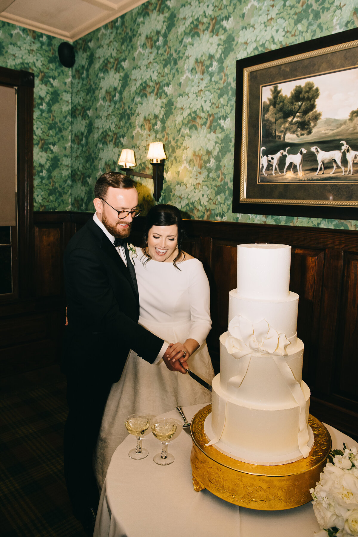 Bride and groom cutting the cake at the Willcox Aiken