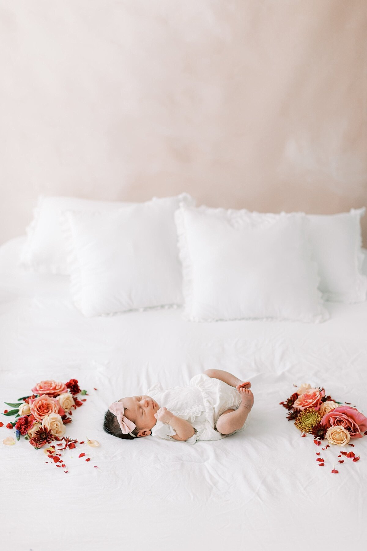 fine art photo of baby girl with flowers