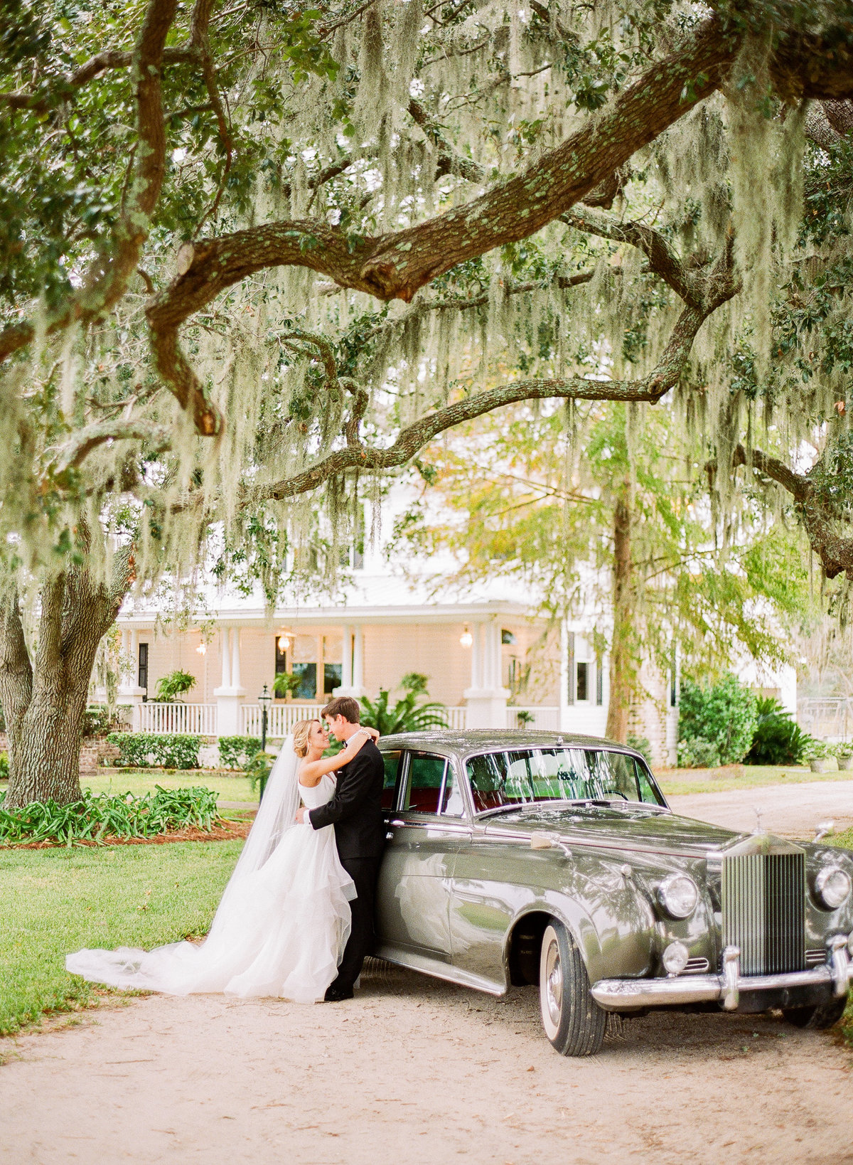Charleston Newlywed couples portraits with 1961 rolls royce getaway car