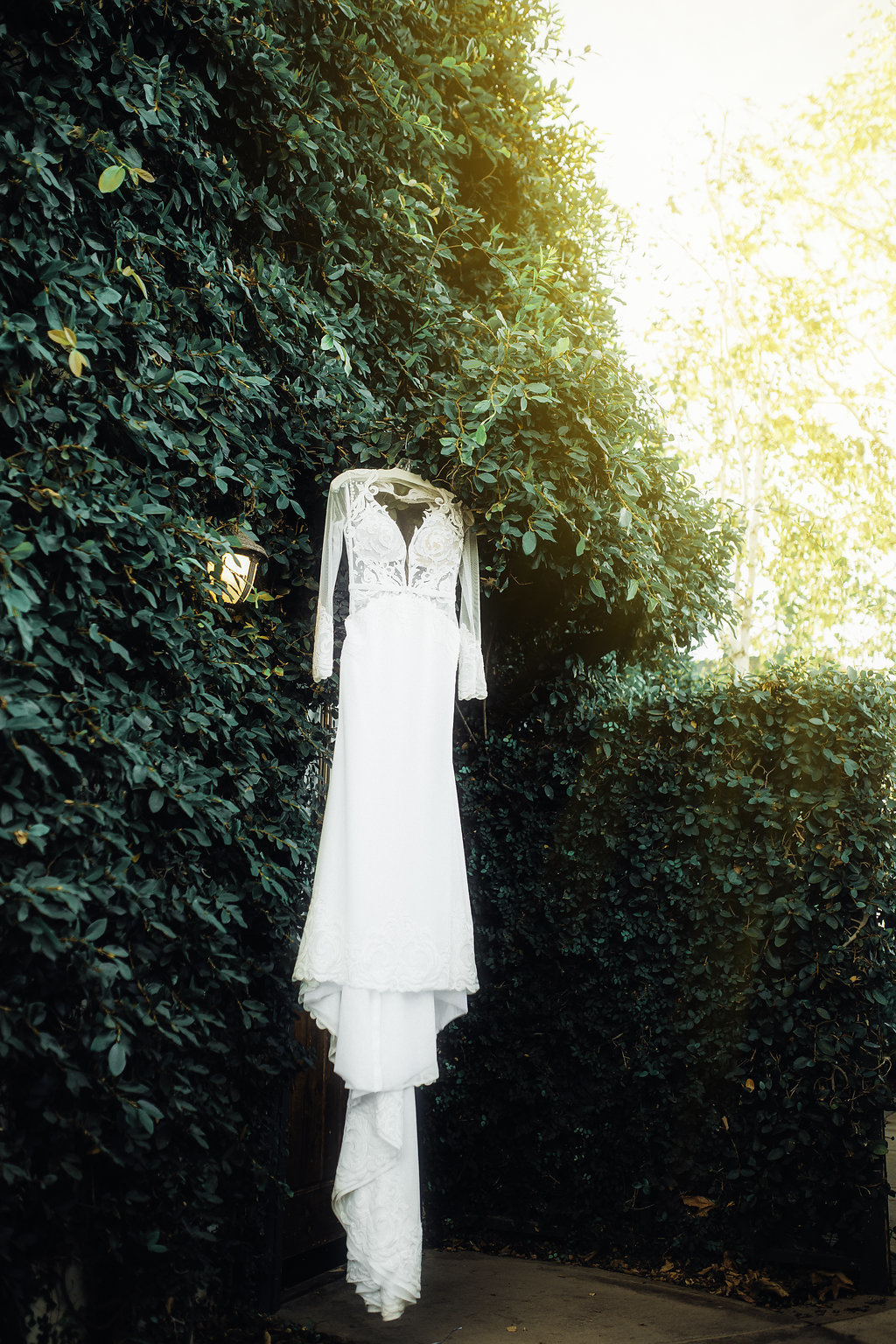 Wedding Photograph Of Hanging White Dress Los Angeles