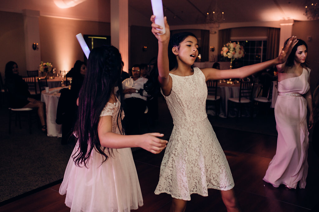 Wedding Photograph Of Young Women Raising Their Light Sticks Los Angeles