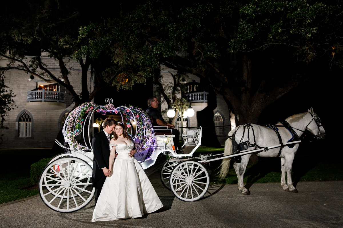 Austin wedding photographer castle avalon wedding photographer bride groom horse carriage