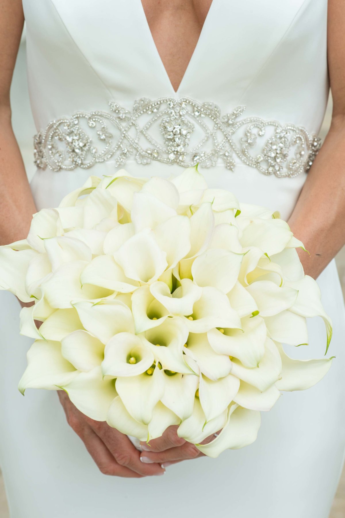 Bride with a white floral bouquet