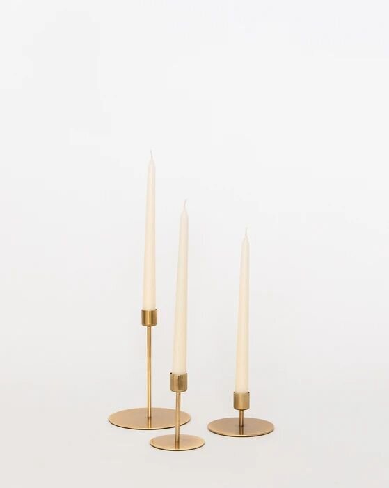 Taper candles and stand rentals through Primrose and Petals.