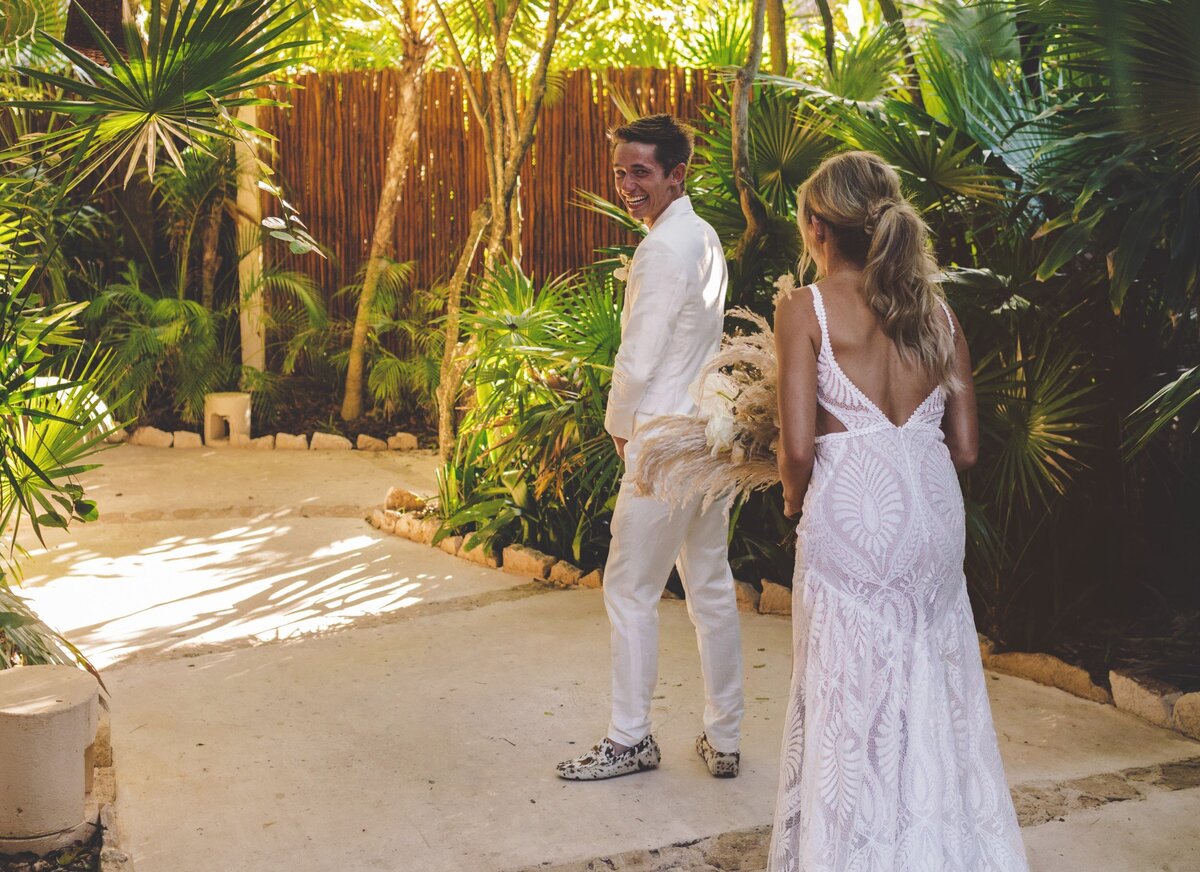 Groom reaction to seeing the bride for the first time at viceroy riviera maya wedding