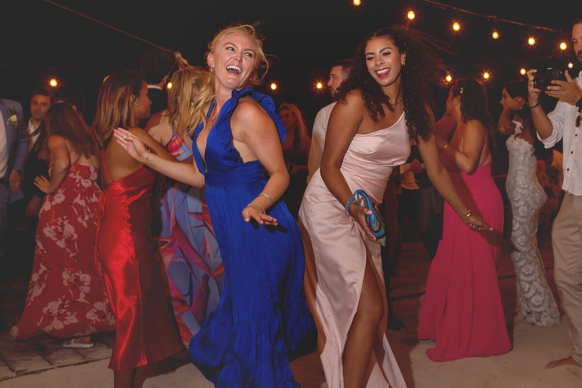 Guests having fun and dancing at  Riviera Maya wedding.