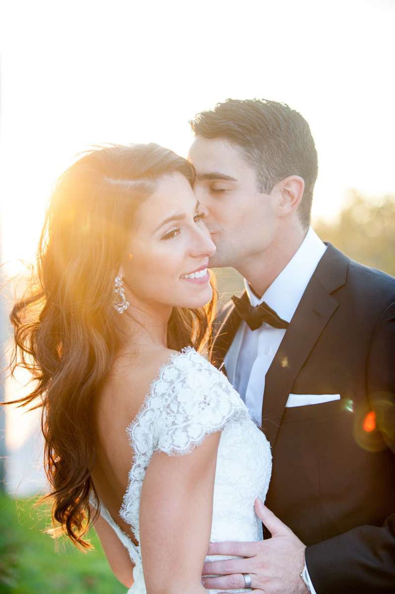 light bright wedding liberty house nj photography sunset golden hour kiss happy candid love