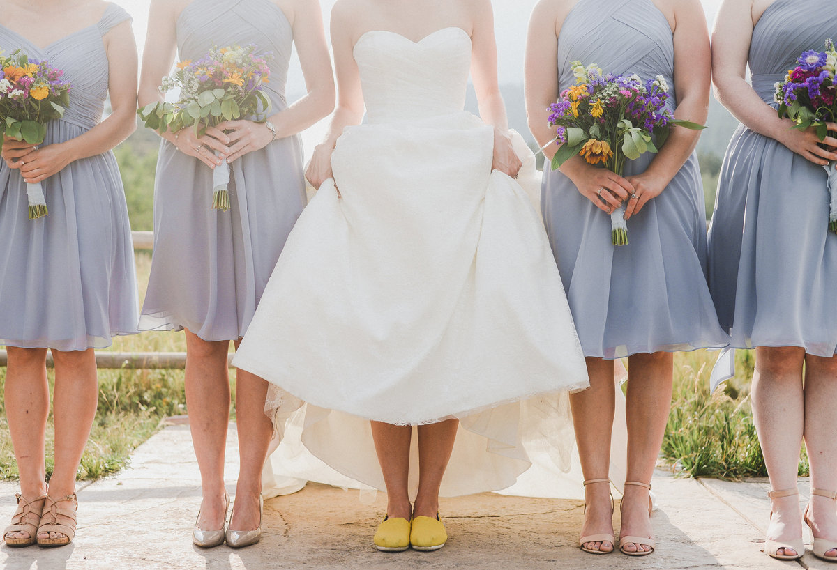 Bride with bridesmaids in lilac dresses