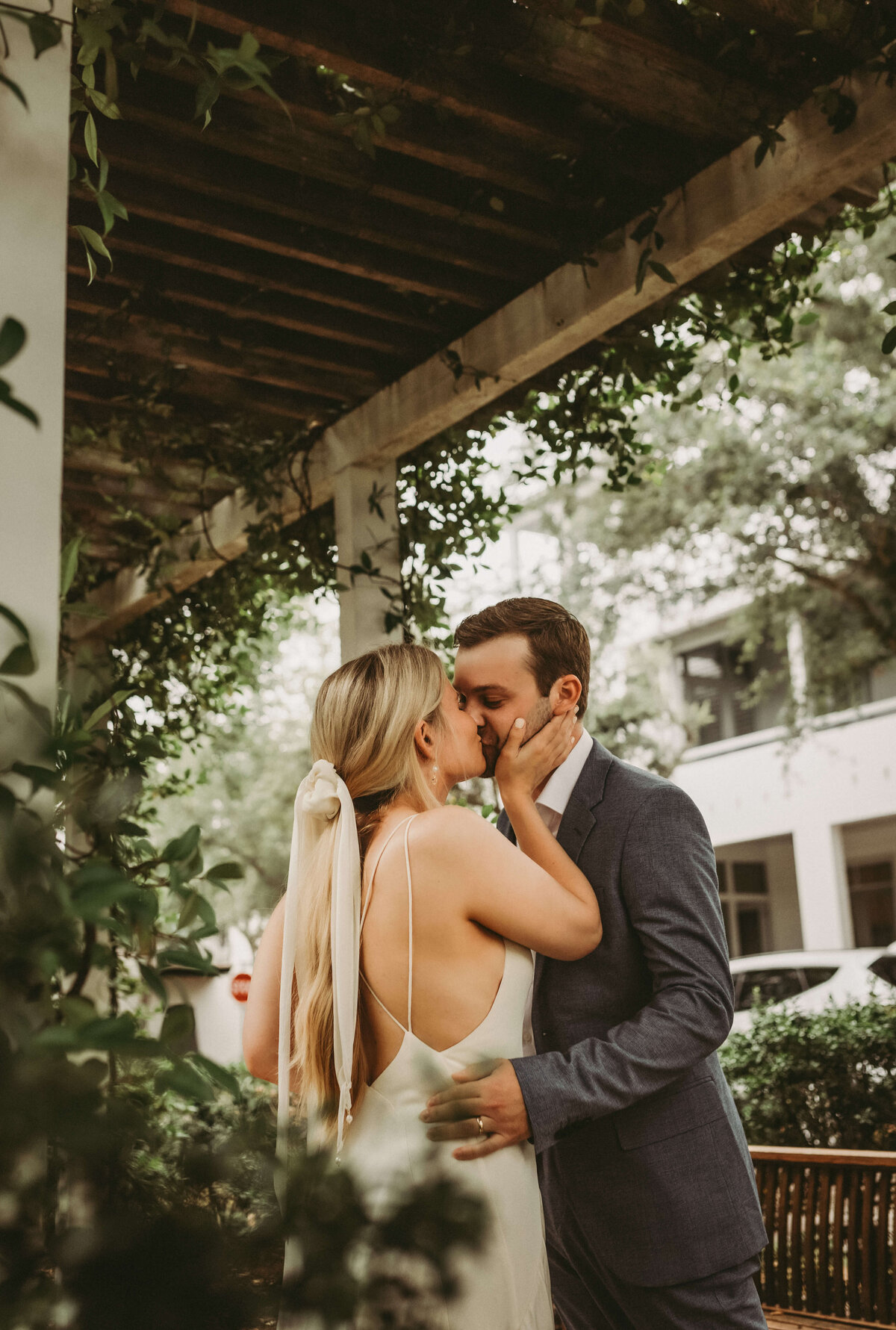 newlyweds kiss after intimate elopement wedding