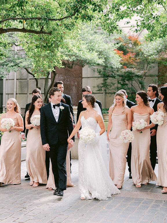 Bride and groom with bridal party at romantic wedding at Hotel Crescent Court, Dallas