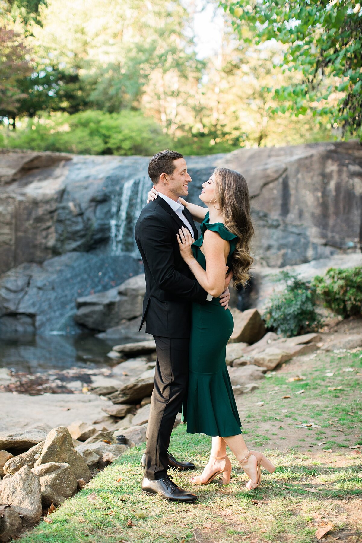 Greenville  Wedding Photographer, couple standing with their arms around each other