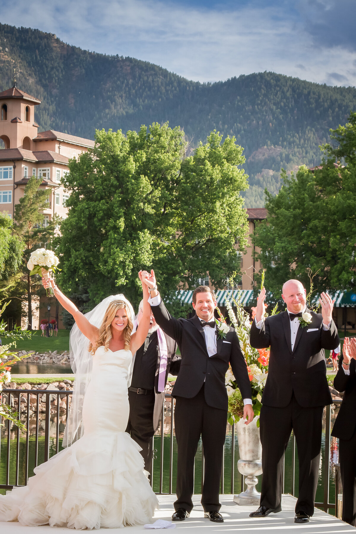 Just Married Bride and Groom on Lakeside Terrace Broadmoor Hotel, Colorado