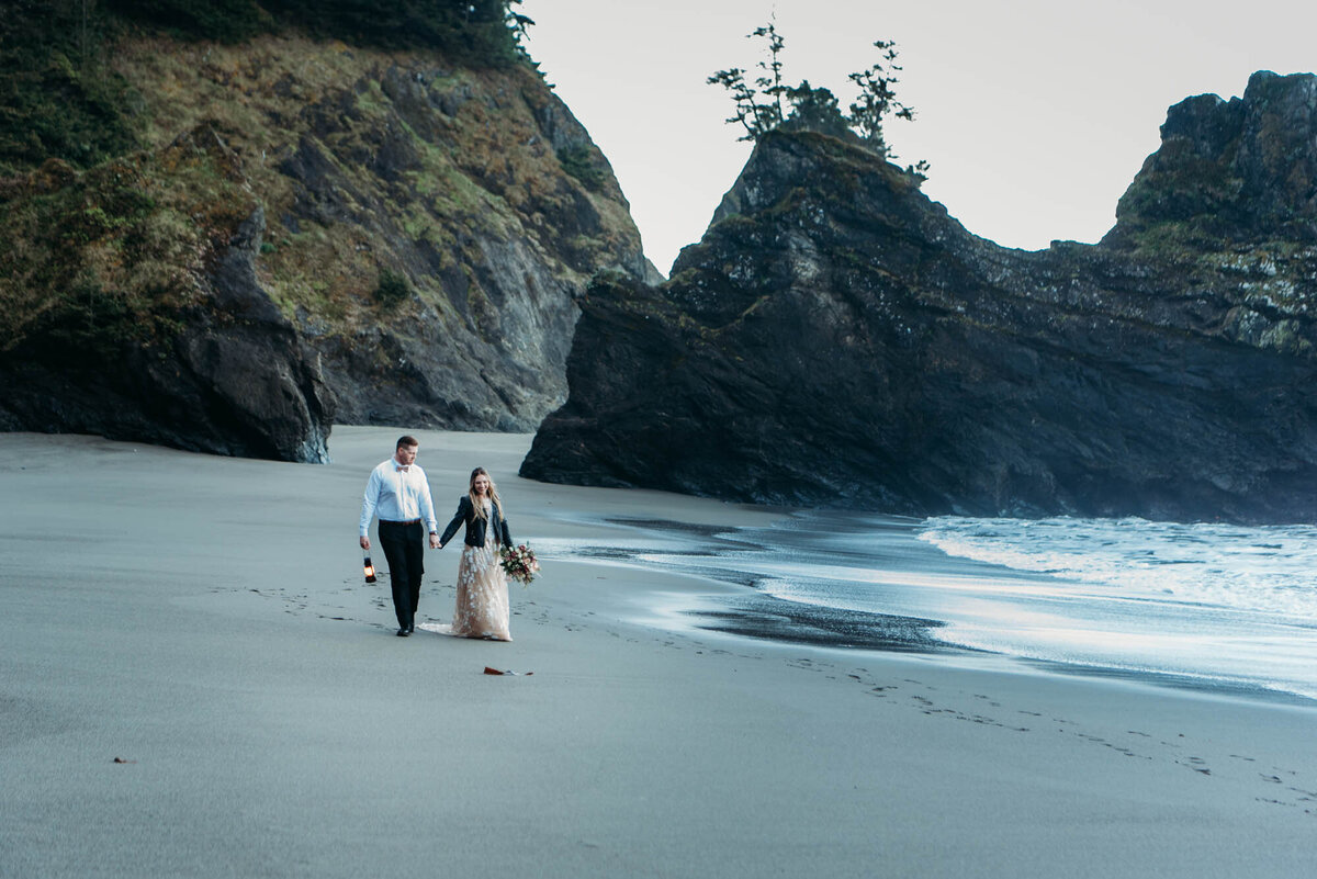 Elopement on Secret Beach couple walking