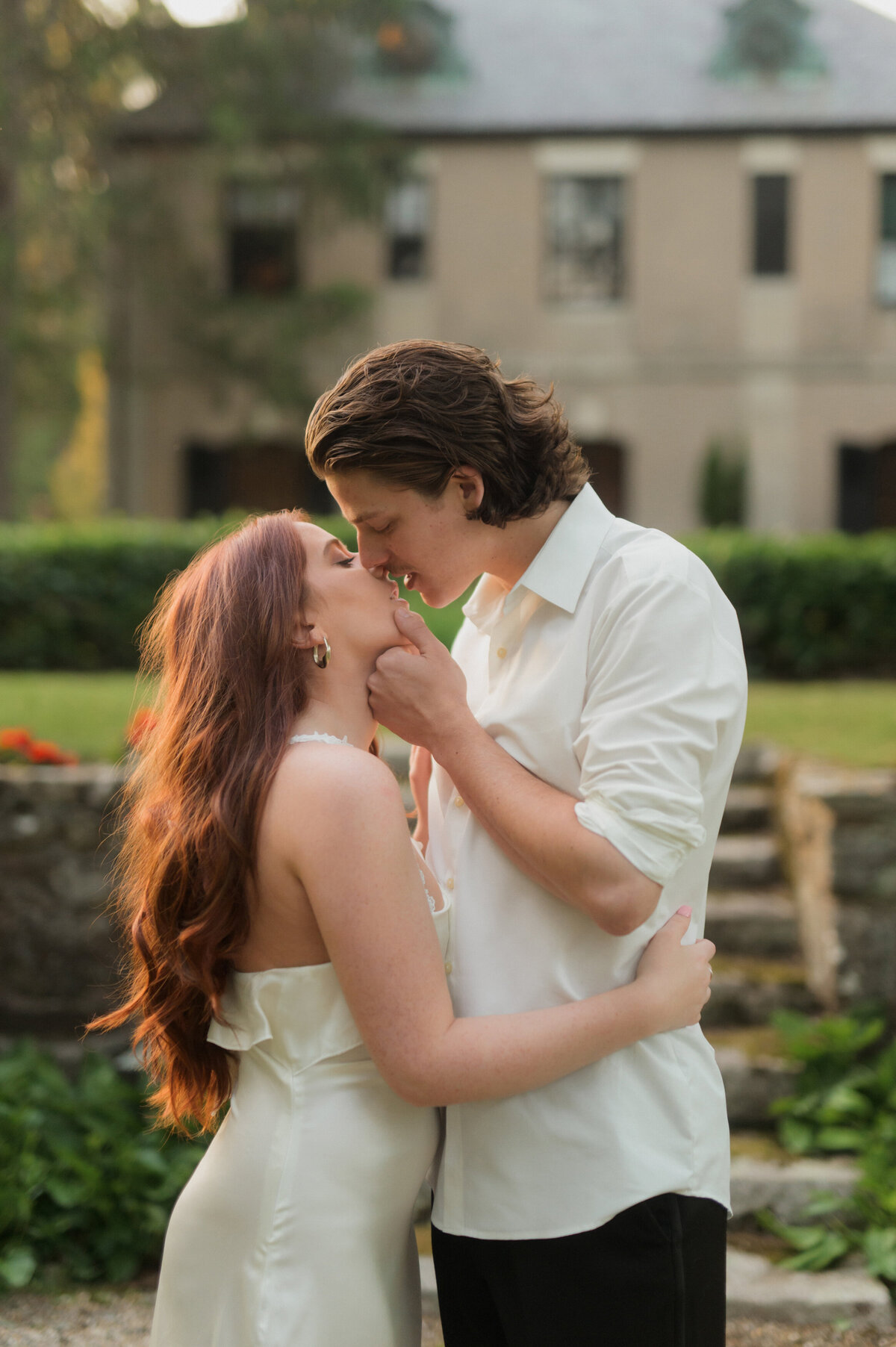 french countryside estate engagement session in ipswich massachusetts. women with red hair and white dress for fine art portraits in New England.