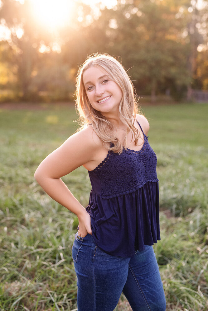 Senior session of young woman in purple top