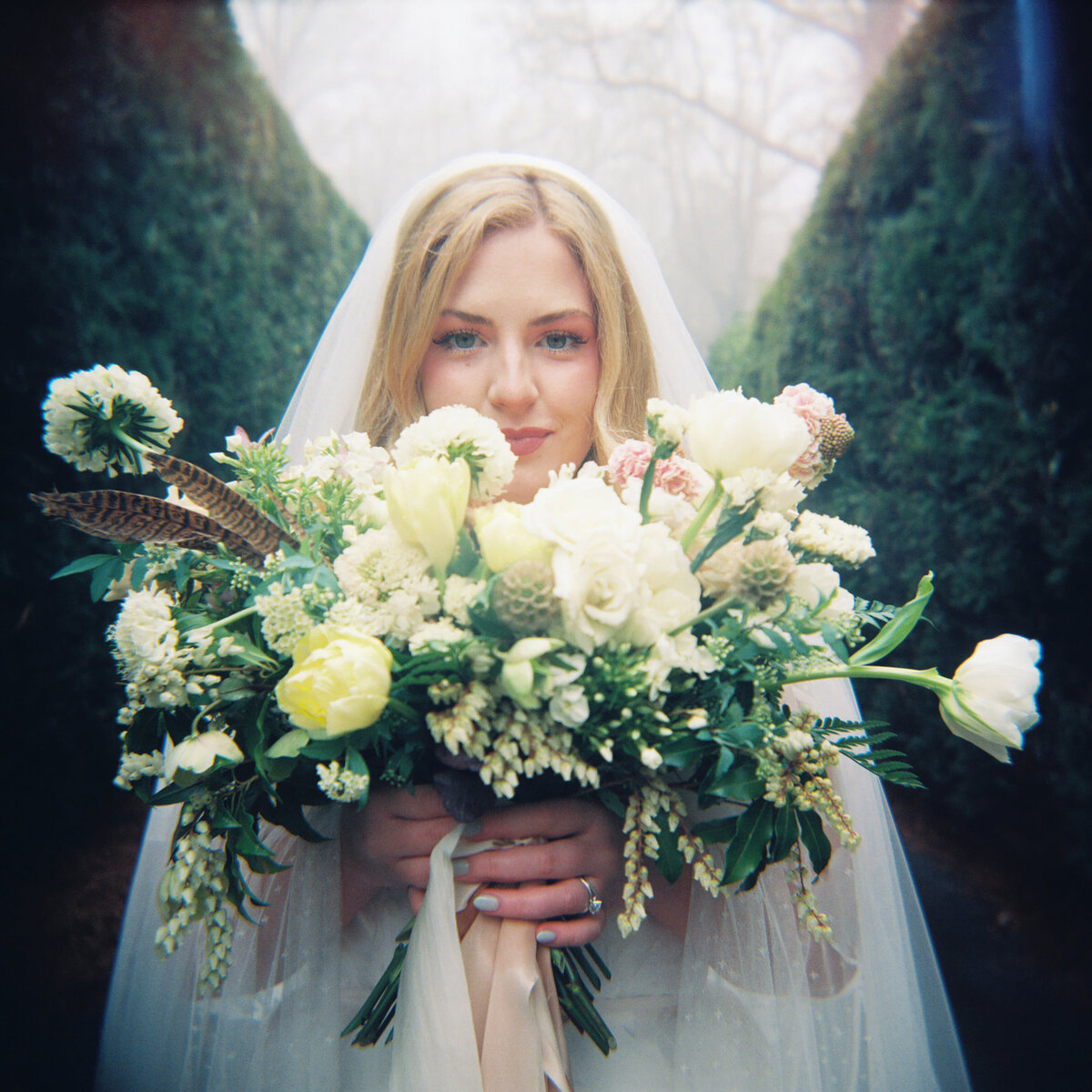 bride-holds-bouquet-237