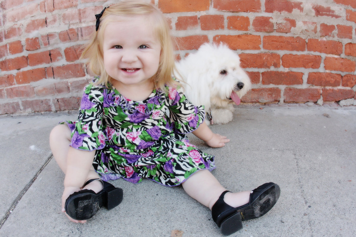 little girl with her pup