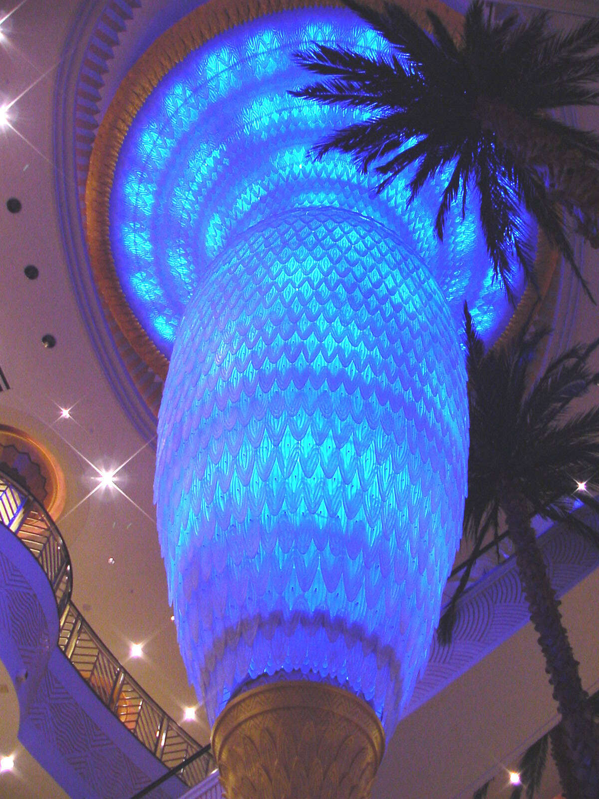 Elevate your visit to Planet Hollywood Casino with the radiant glow of its interior chandeliers. Discover luxury and indulgence at every corner.