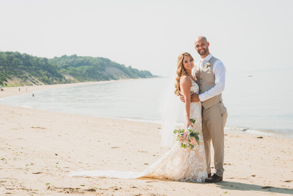 bride and groom on the beach from wedding at Pavilion at Sunken Meadow