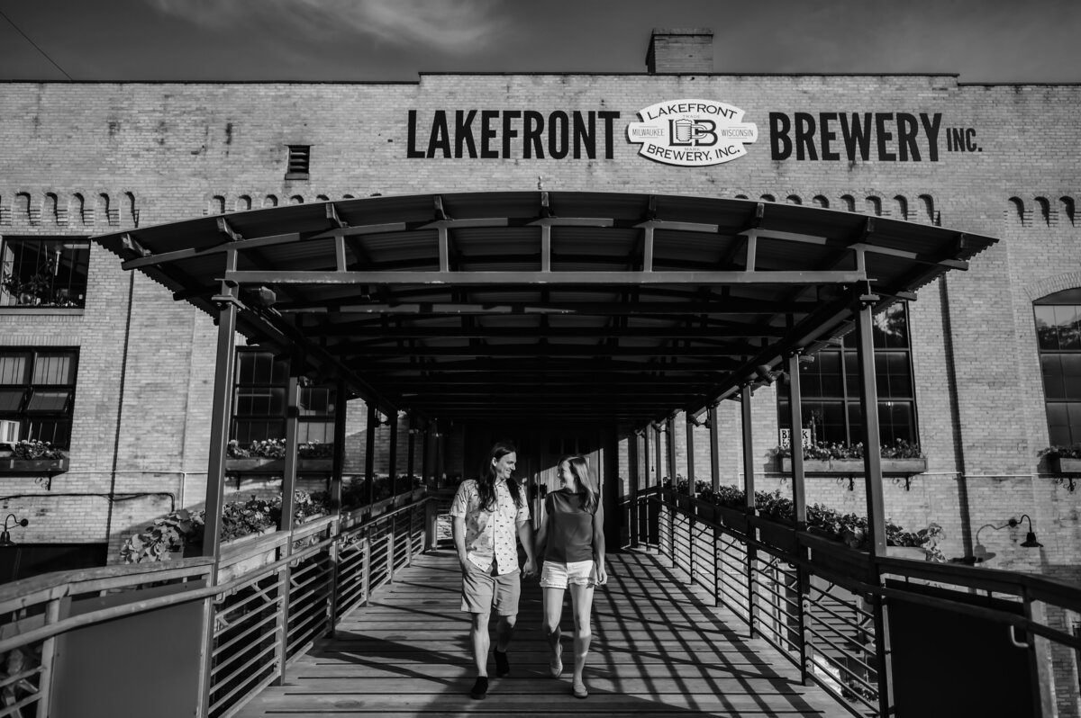 A couple walk out of the Lakefront Brewery in Milwaukee, WI