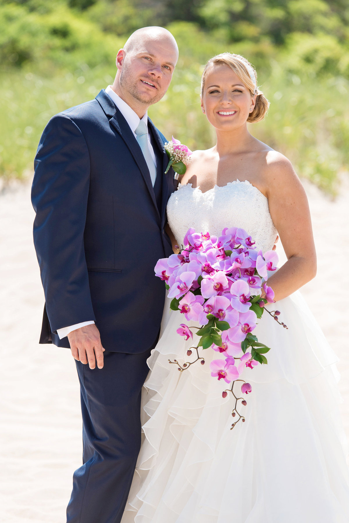 photo of bride and groom on the beach from wedding reception at Pavilion at Sunken Meadow