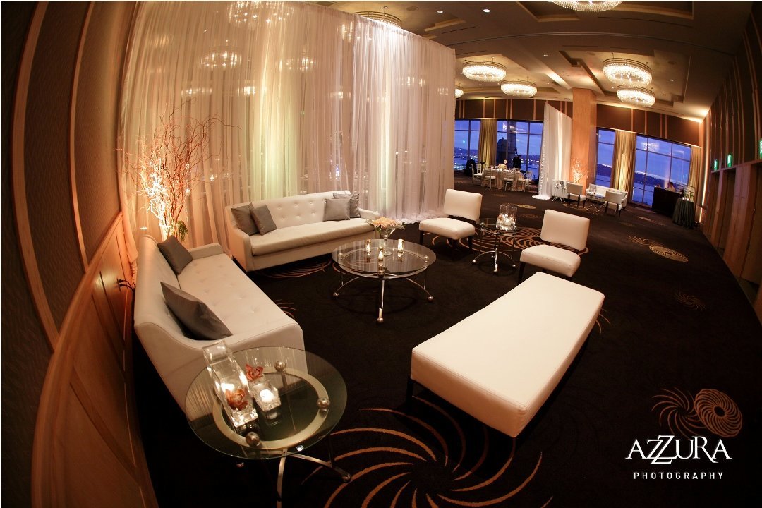 white lounge furniture and raping divider for anniversary party at Four Seasons Hotel Seattle