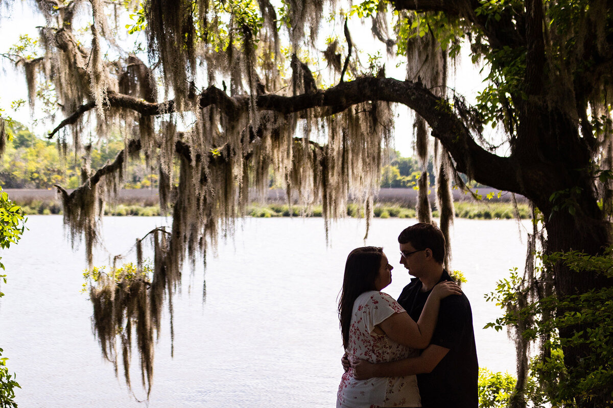 Silhouette of couple at Magnolia Plantation and Gardens engagement session Charleston Wedding Photographer